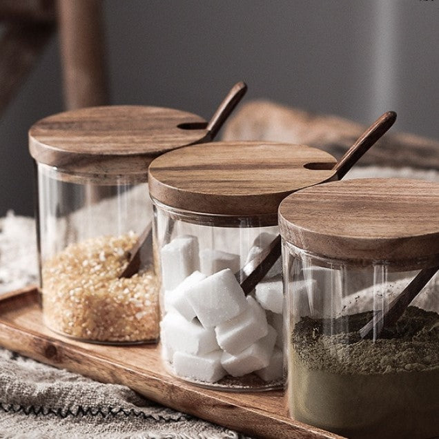 Smooth Acacia Wood Lids On Glass Food Container Jars With Wooden Spoons And Tray