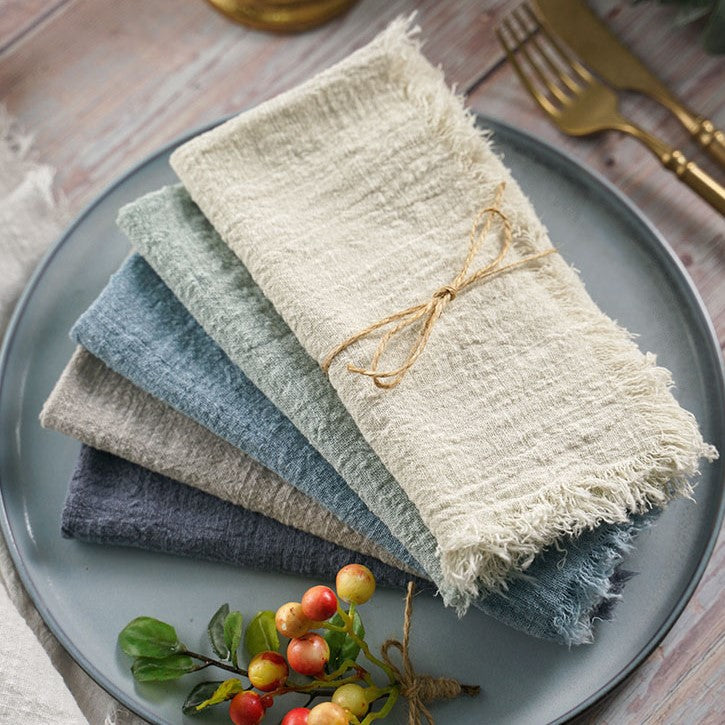 Beautiful Cotton Napkins In Earthy Organic Pastel Colors On Farmhouse Style Table