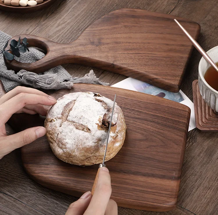 Cutting Fresh Baked Dessert Bread On Medium Size Cutting Board Made Of Walnut Wood Harmony Farmhouse Style Small And Medium Matching Cutting Boards