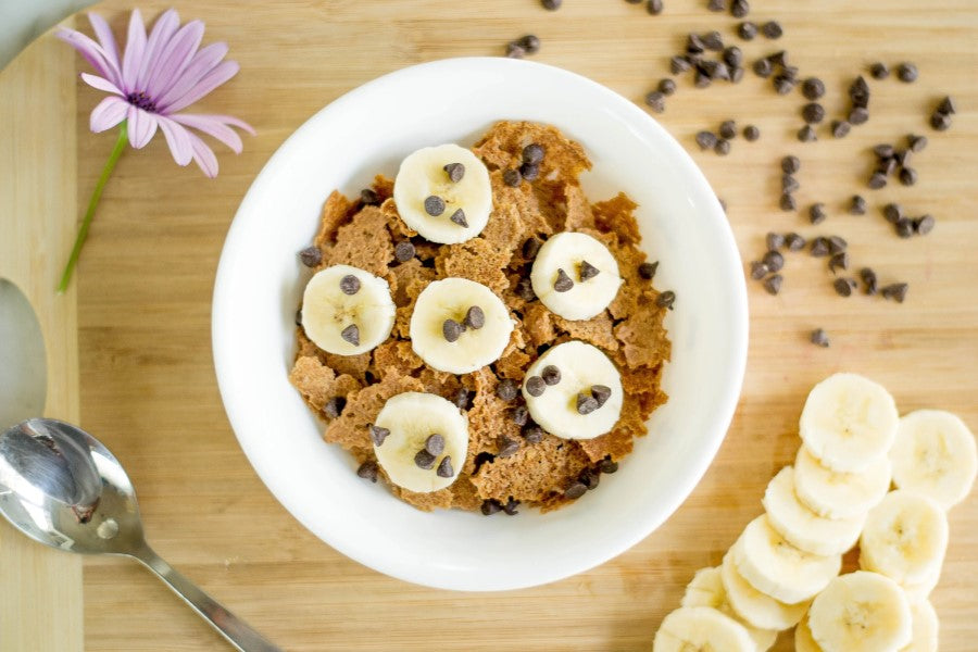 Vegan Chocolate Chips And Organic Banana Slices On NuCoconut Grain Free Cereal NUCO Coconut Crunch
