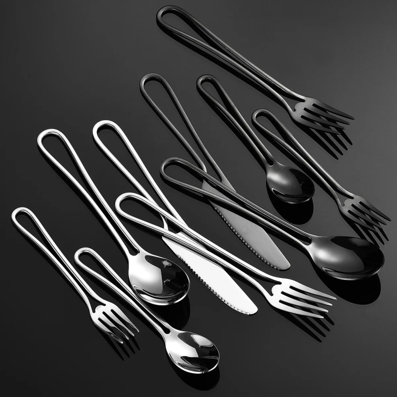 Modern Chic Black And Silver Flatware With Minimalist Style And Cut Out Handles