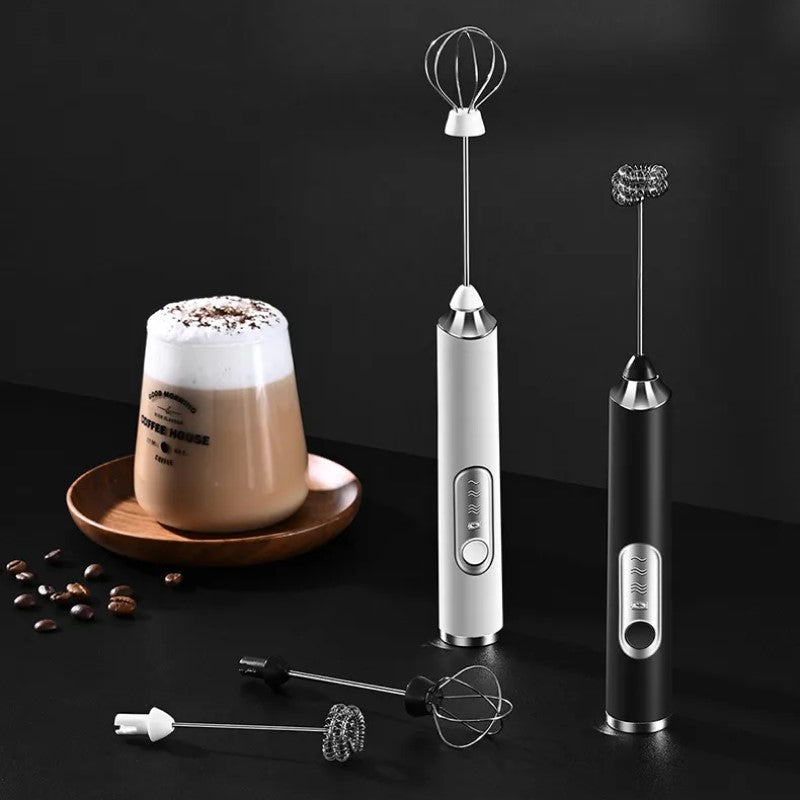 Coffee Beans And Foamy Latte With Modern Handheld Milk Frother Wands And Stainless Steel Attachment Heads For Whisking