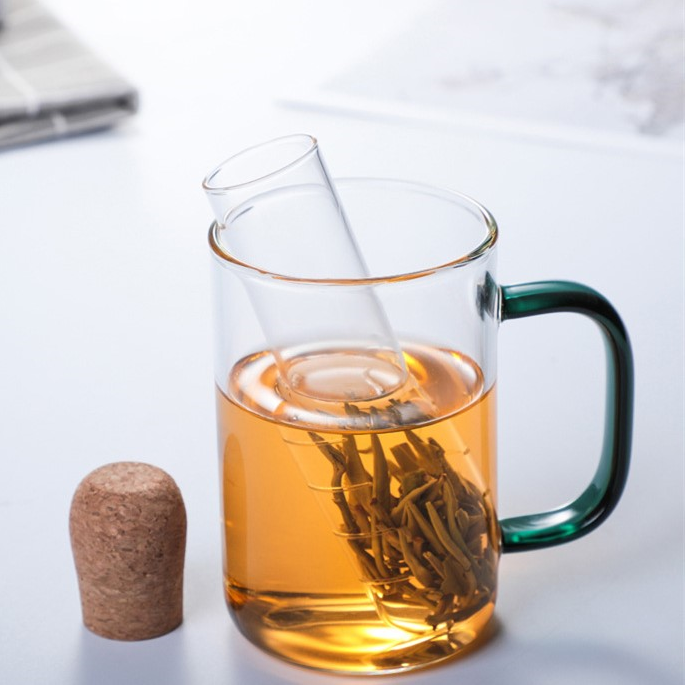 Cup Of Tea Made With Glass Tube Tea Strainer And Herb Infuser With Cork Style Lid