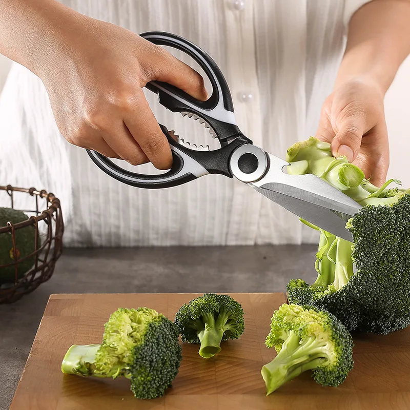 Fresh Broccoli Prep Cutting Vegetable With Kitchen Scissors