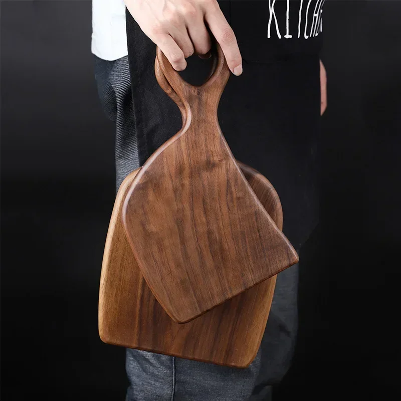 Home Chef Holding Small And Medium Wood Cutting Boards For Food Prep And Serving Harmony Farmhouse Style Walnut Wood Kitchen Decor