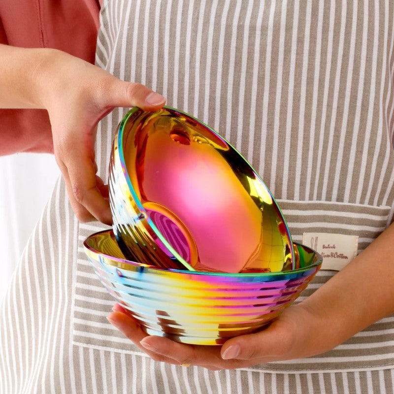 Home Chef Holding Two Iridescent Rainbow Metal Bowls For Hot And Cold Meals