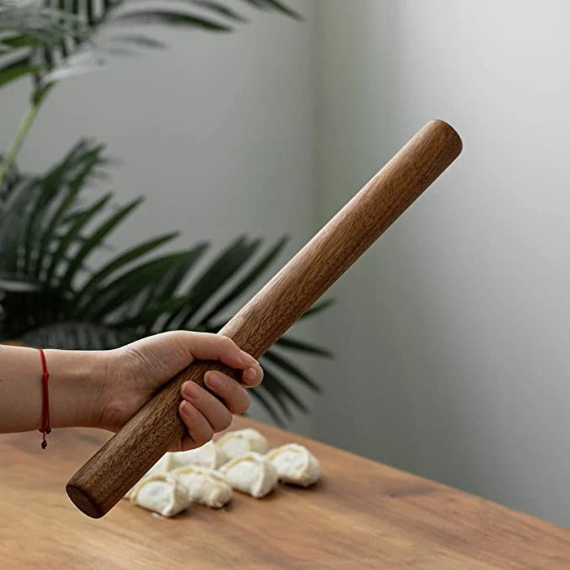 Holding Walnut Wood French Dowel Style Rolling Pin