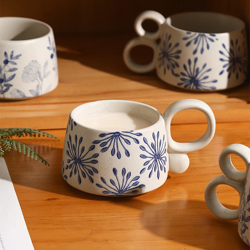 Pottery With Loop Handles Nature In Blue Ceramic Mugs In Garden Inspired Patterns