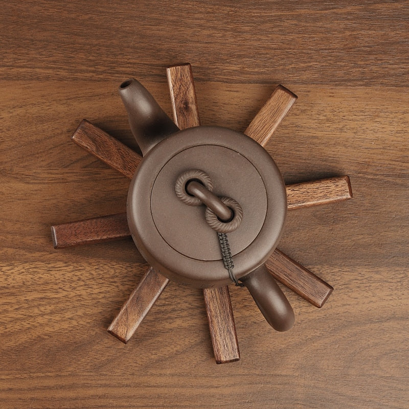 Overview Of Collapsible Wood Trivet Hot Pad Holding Hot Tea Pot