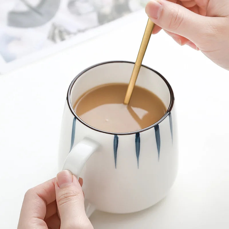 Enjoying A Cup Of Coffee In Blue And White Ceramic Mug Nautical Style