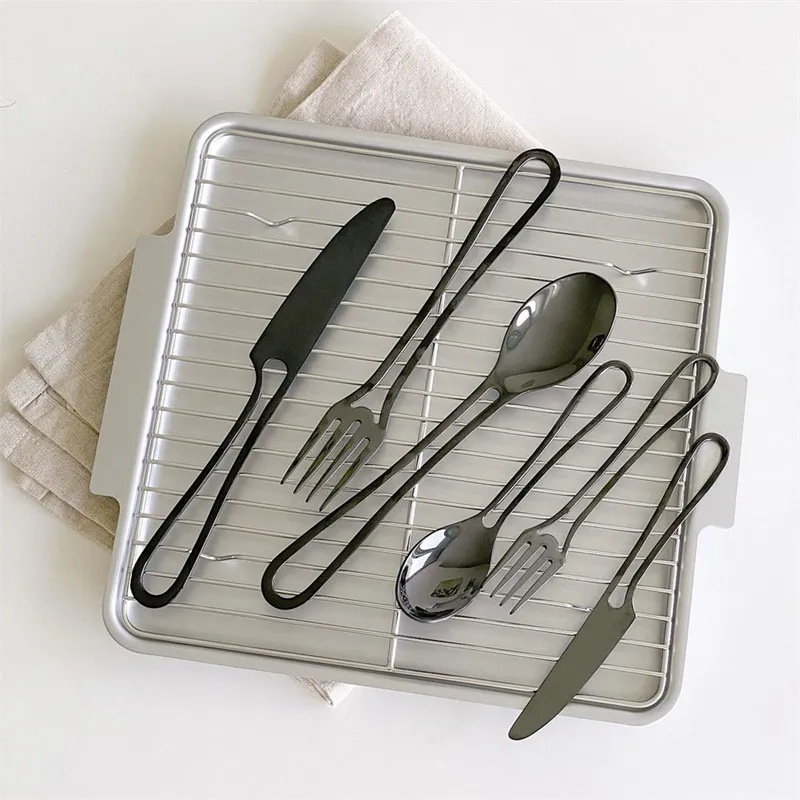 Kitchenware And Minimalist Cut Out Handle Style Flatware Pieces Knives Forks Spoons