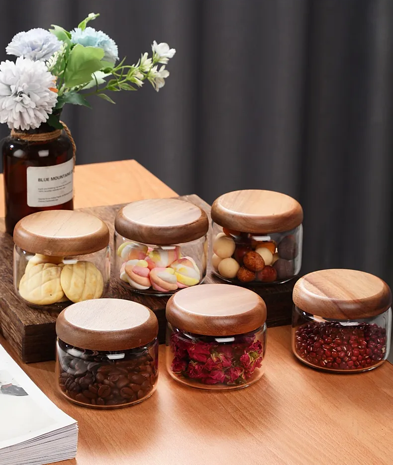 Small Jars With Coffee Beans Dried Flowers Popcorn Cookies Candy And Other Snacks Resealable Wood Lids On Glass Jars