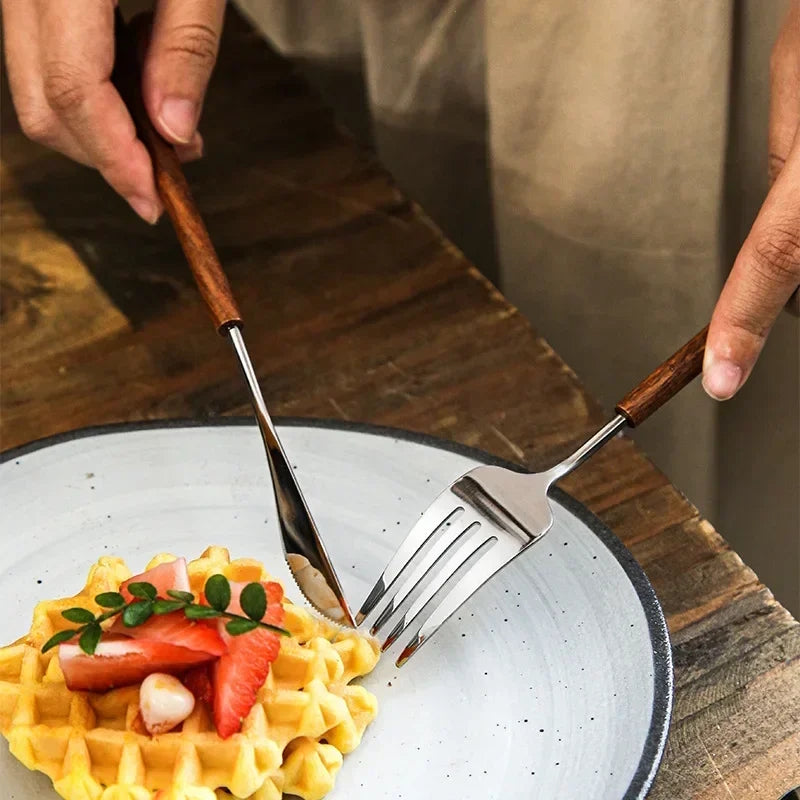 Using Stainless Steel Metal Dinner Knife And Fork Utensils With Rosewood Handles