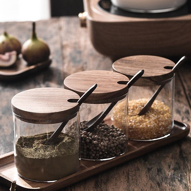 Glass Food Jars With Beautiful Acacia Wood Lids And Wooden Oval Spoons On Acacia Tray
