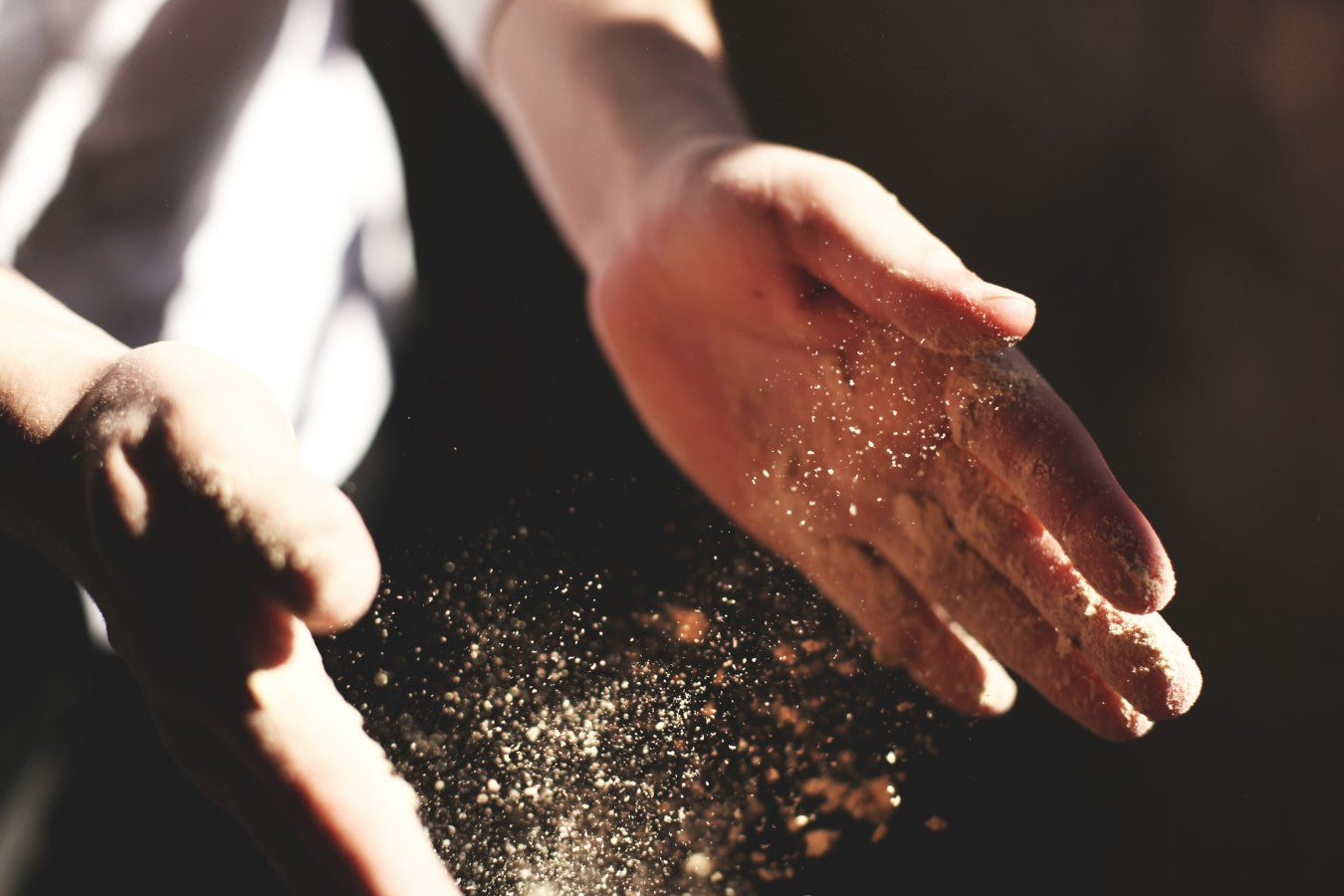 Bakers Hands Using Organic Non-GMO Flour