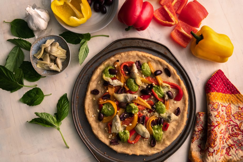 Bob's Red Mill Recipe Cassava Pizza Crust Made With Gluten Free Cassava Flour Topped With Garlic Bell Peppers Artichokes Olives And More