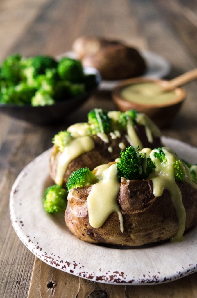Dairy Free Creamy Cheese Sauce On Broccoli Topped Baked Potatoes Made With Bobs Red Mill Nutritional Flakes