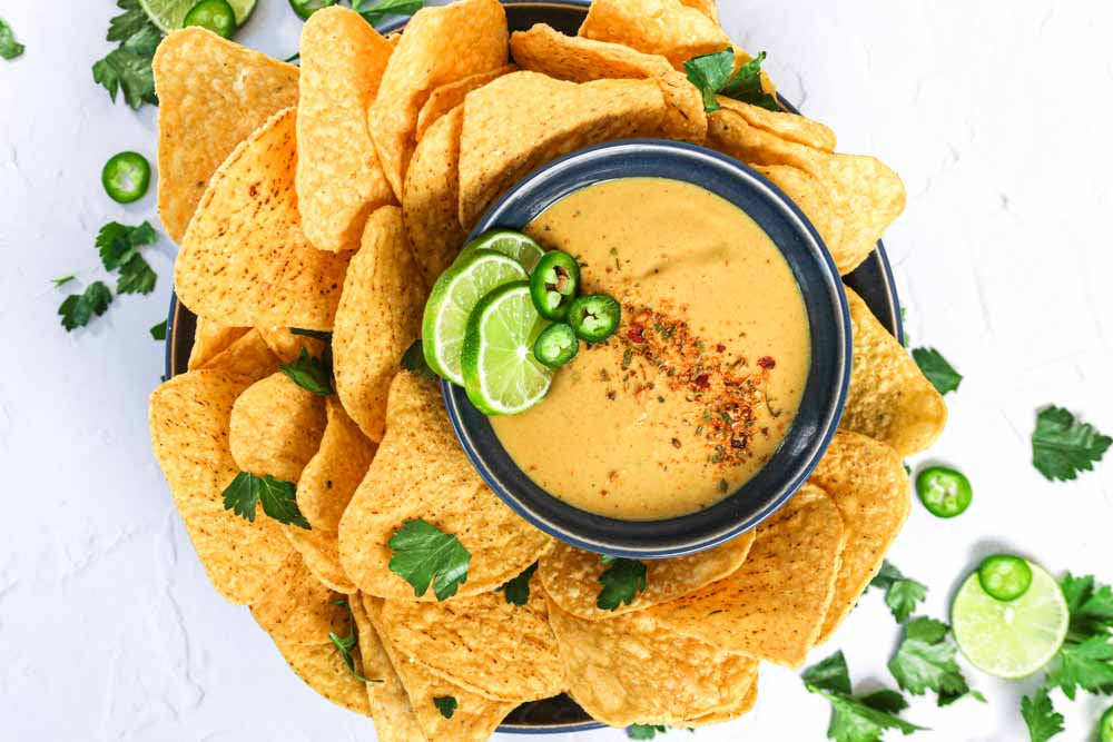 Organic Corn Chips And Vegan Nacho Cheese Sauce Recipe Made With Nutritional Yeast From Bob's Red Mill