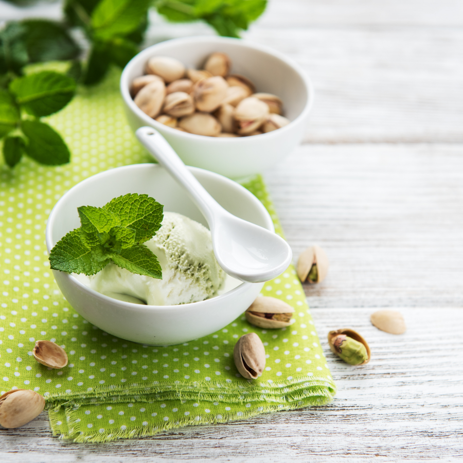 Bowl Of Organic Pistachios And Pistachio Mint Ice Cream Made With Dry Roasted Nuts From Terra Powders Market