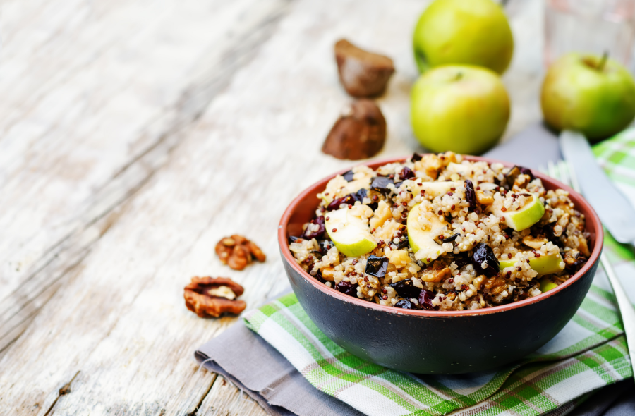Bowl Of Tri-Color Quinoa With Fresh Apple Walnuts And Dried Cranberries Wholesome Autumn Recipe Using Sideaway Colorful Organic Quinoa From Terra Powders
