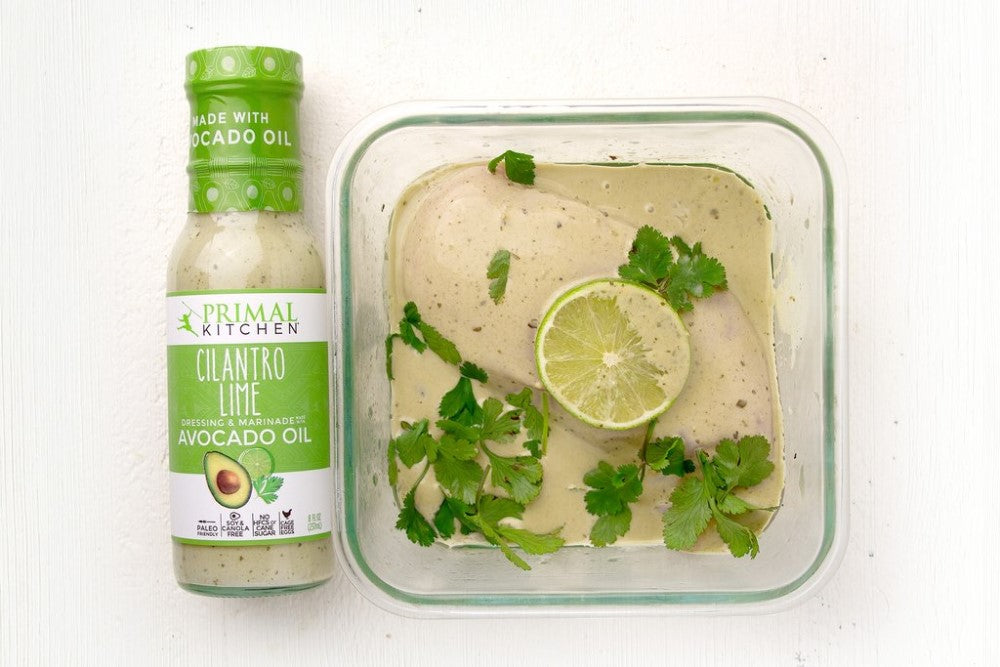 Marinating Chicken Breast Using Primal Kitchen Paleo Friendly Cilantro Lime Marinade Made With Avocado Oil