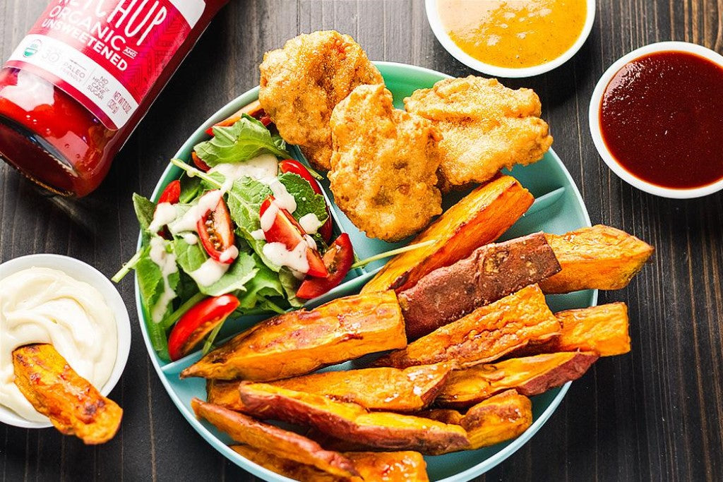 Chicken Nuggets With Unsweetened Primal Kitchen Ketchup Sweet Potato Fries And Salad