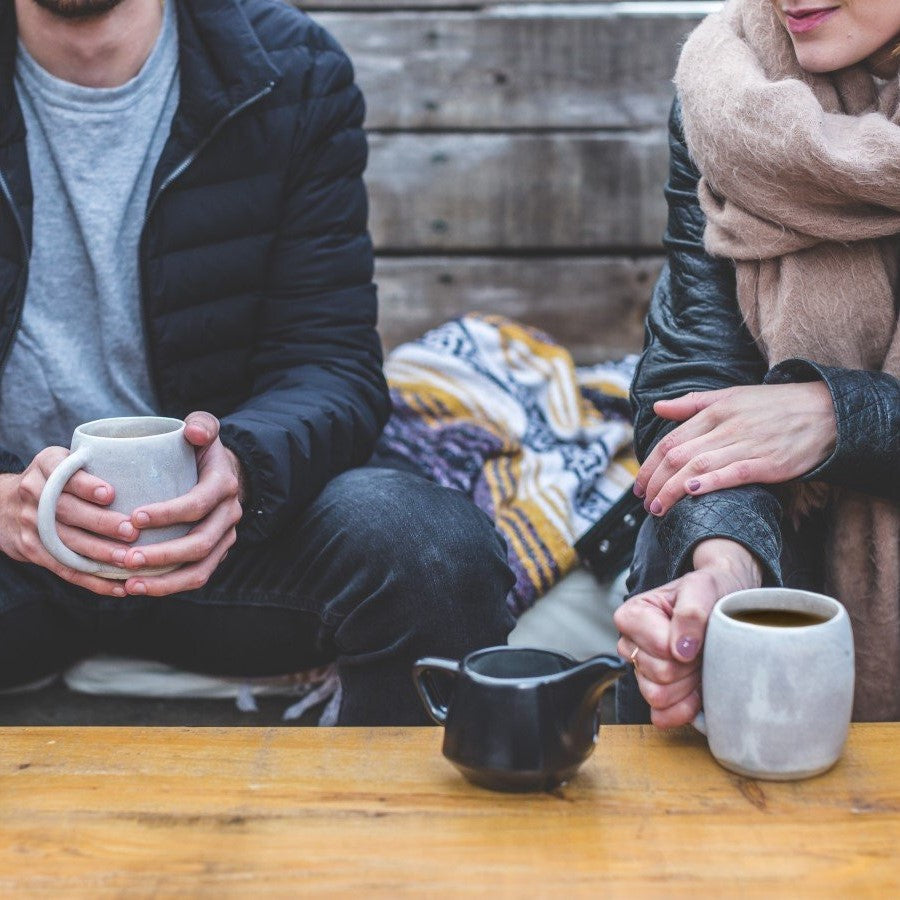 Couple Outdoors Dressed Warm Enjoying Coffee Together