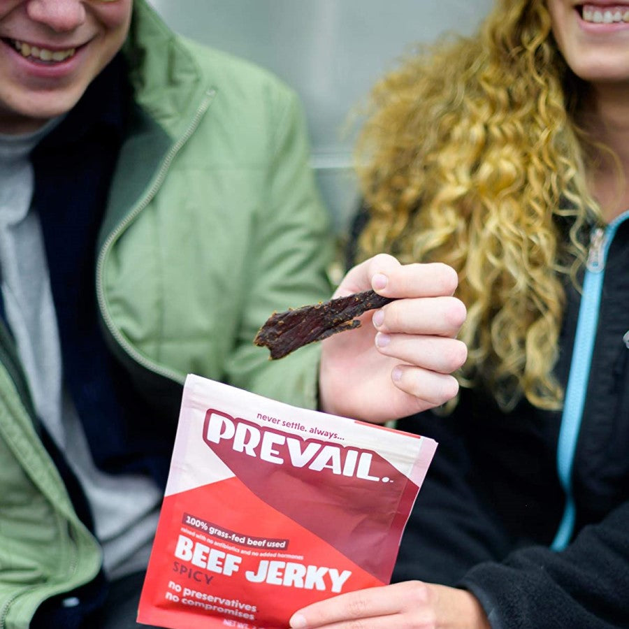 Friends Eating Spicy Prevail Beef Jerky Snack