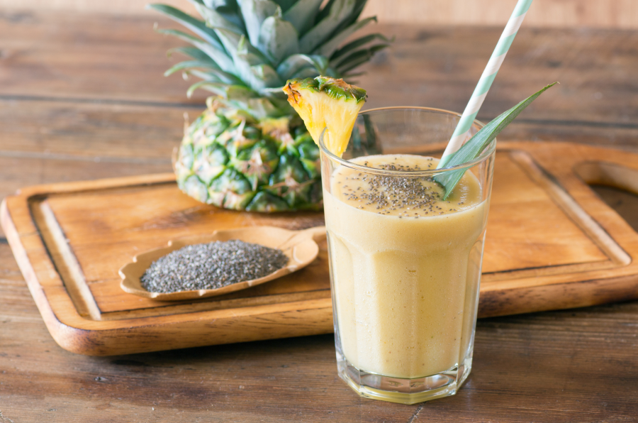 Glass Of Pineapple Smoothie Made With Pineapple Coconut Water From Terra Powders Drink Garnished With Fresh Pineapple And Organic Chia Seeds