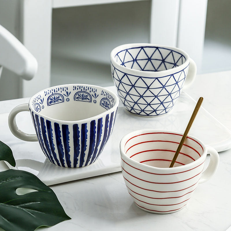 Colorful Irregular Shaped Mugs With Prints Inside And Out Blue And Red Colors Artistic Style Cups