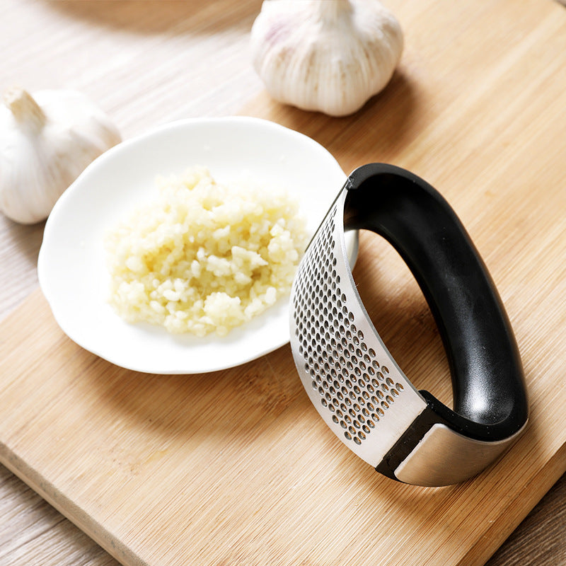Mince Garlic Easy With The Black Handle Stainless Steel Curved Garlic Rocker Press From Terra Powders