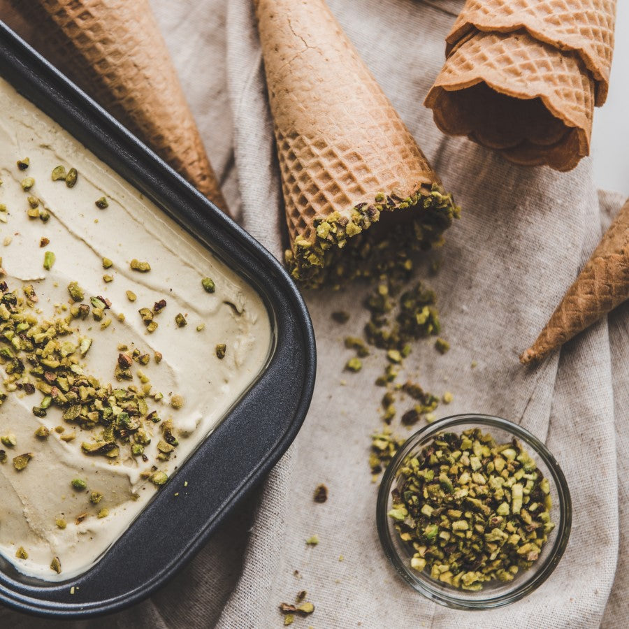 Homemade Vanilla Pistachio Ice Cream And Ice Cream Cones