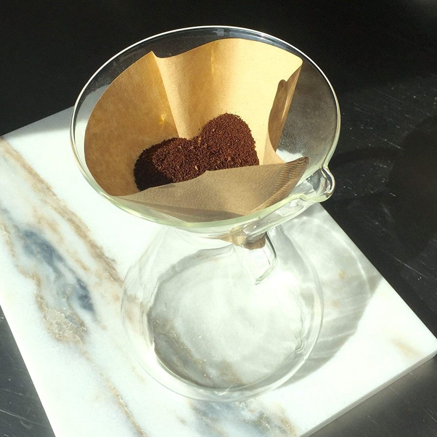 If You Care Cone Shape Coffee Filter In Glass Chemex With Coffee Ground