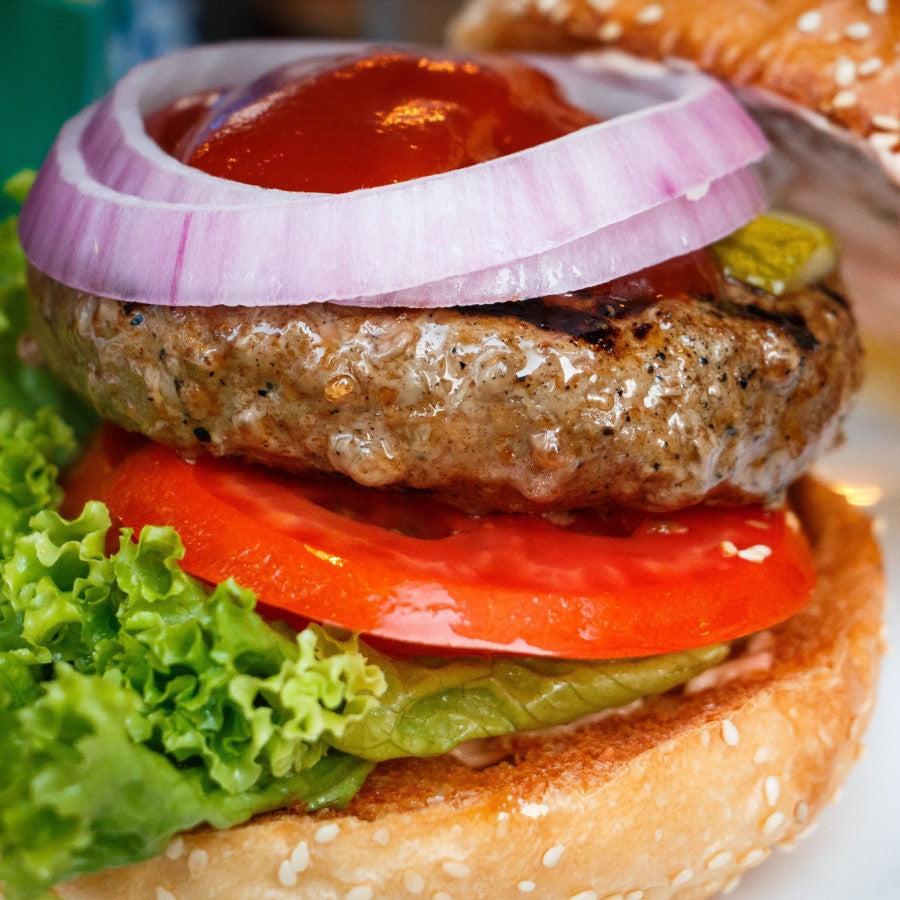 Juicy Burger On Sesame Seed Bun With Fresh Lettuce Tomato Onion And Organic Ketchup From Terra Powders