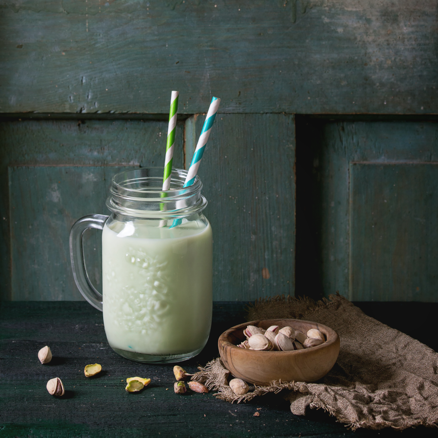 Kefir Yogurt Drink With Paper Straws And Organic Pistachios