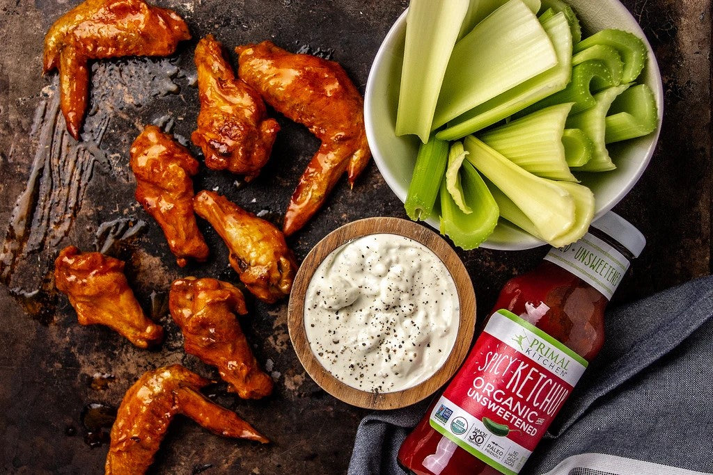 Fresh Organic Celery And Keto Buffalo Chicken Wings Made With Spicy Ketchup From Primal Kitchen