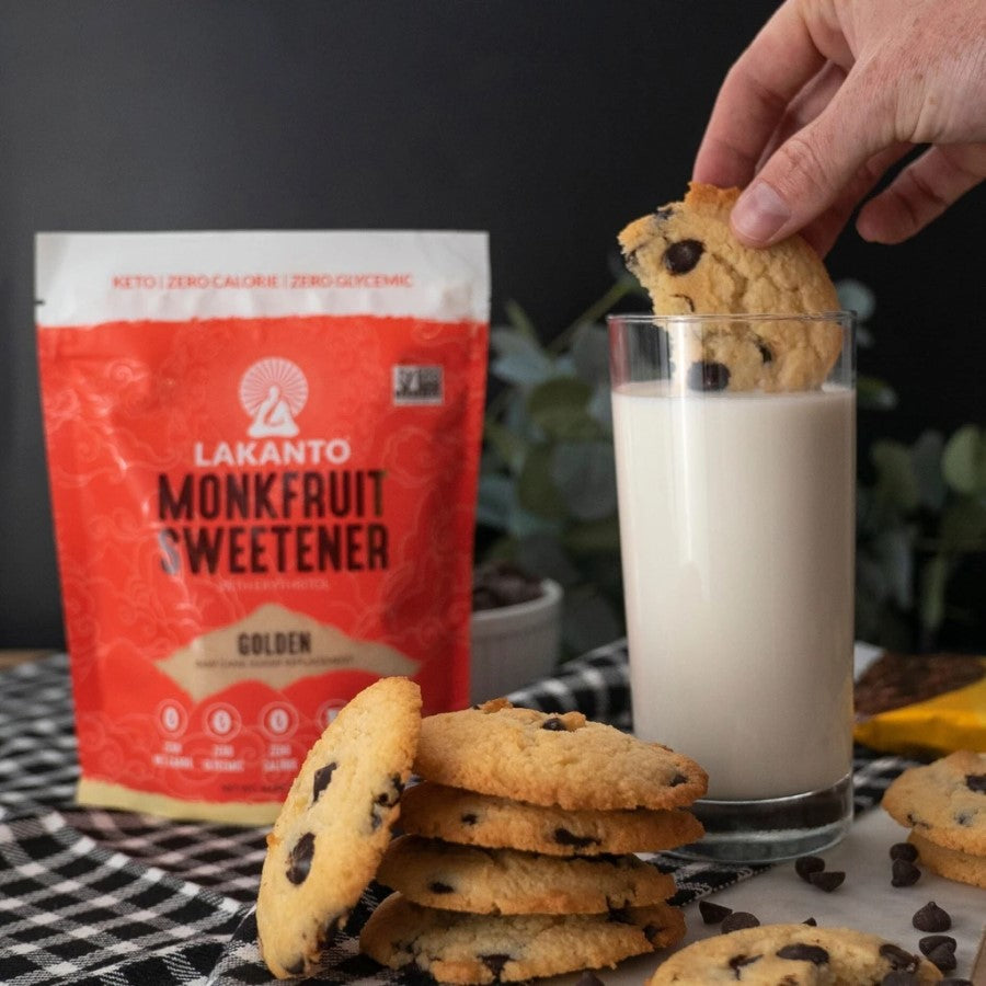 Bag Of Lakanto Monkfruit Golden Sweetener With Keto Approved Chocolate Chip Cookies Dipped In Milk