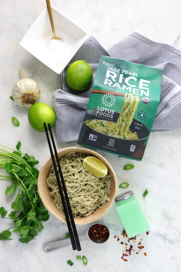 Garlic And Fresh Green Ingredients With Organic Jade Pearl Rice Ramen And Bowl Of Gluten Free Noodles