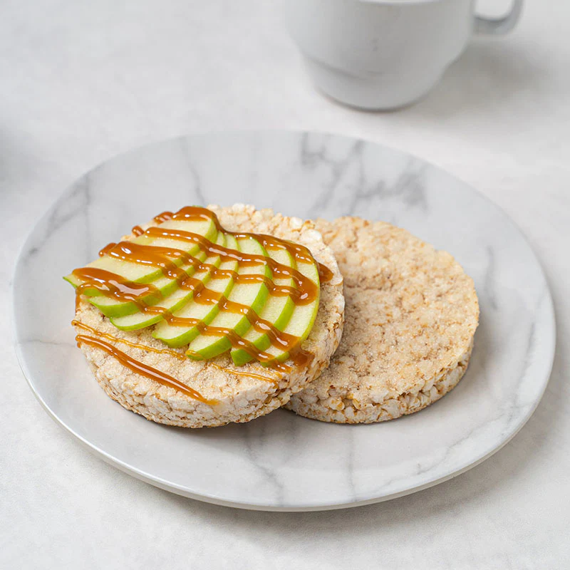 Delicious Snack Lundberg Salted Caramel Rice Cakes Topped With Green Apple Slices And Caramel Drizzle