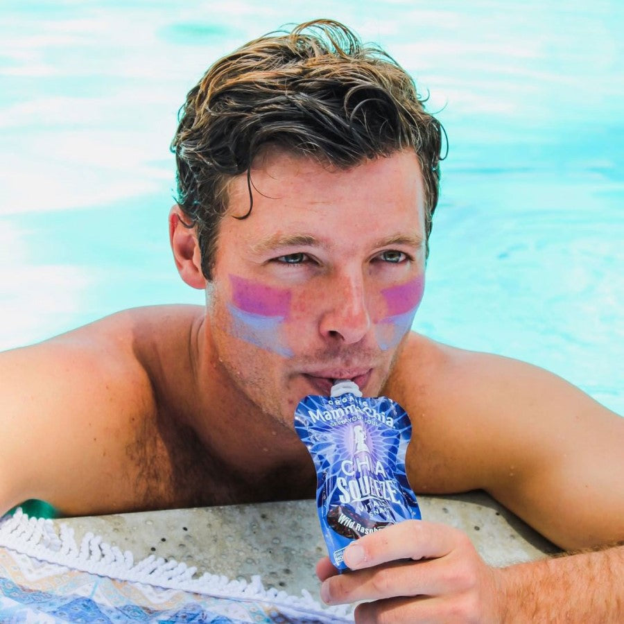 Man Swimming In Pool Enjoying Healthy Wild Raspberry Mamma Chia Snack Pouch