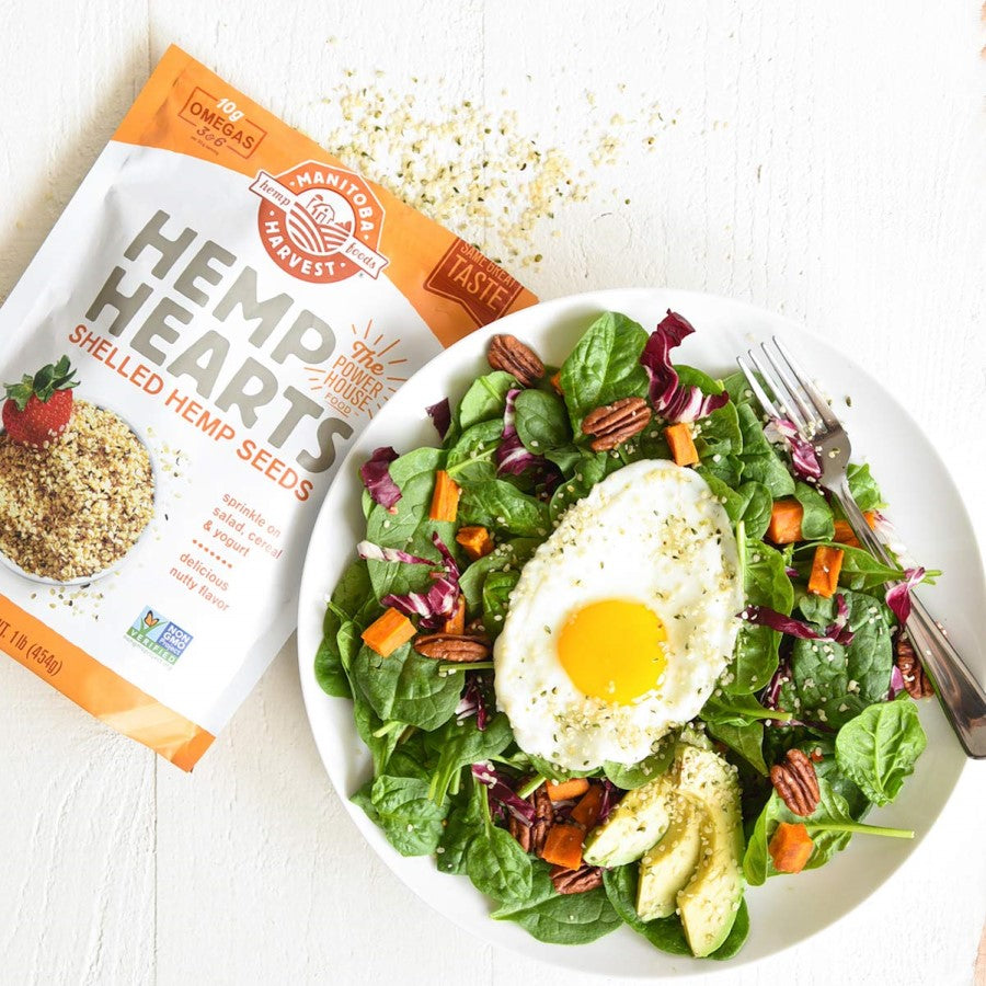 1lb Bag Manitoba Harvest Hemp Hearts With Egg Topped Fresh Spinach Salad Garnished With Shelled Hemp Seeds