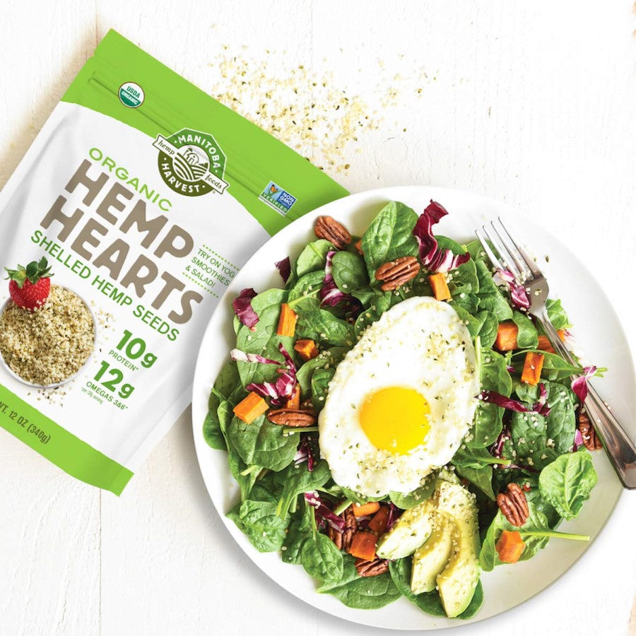 12 Ounce Bag Organic Manitoba Harvest Hemp Hearts With Egg Topped Fresh Spinach Salad Garnished With Shelled Hemp Seeds