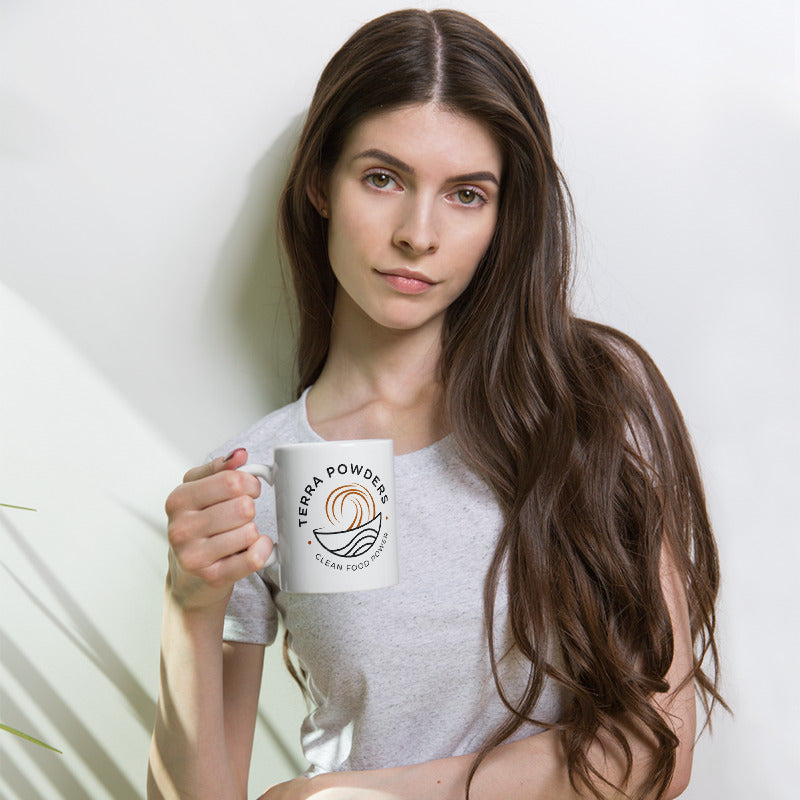 Woman Holding 11oz Terra Powders Mug Of Golden Cocoa