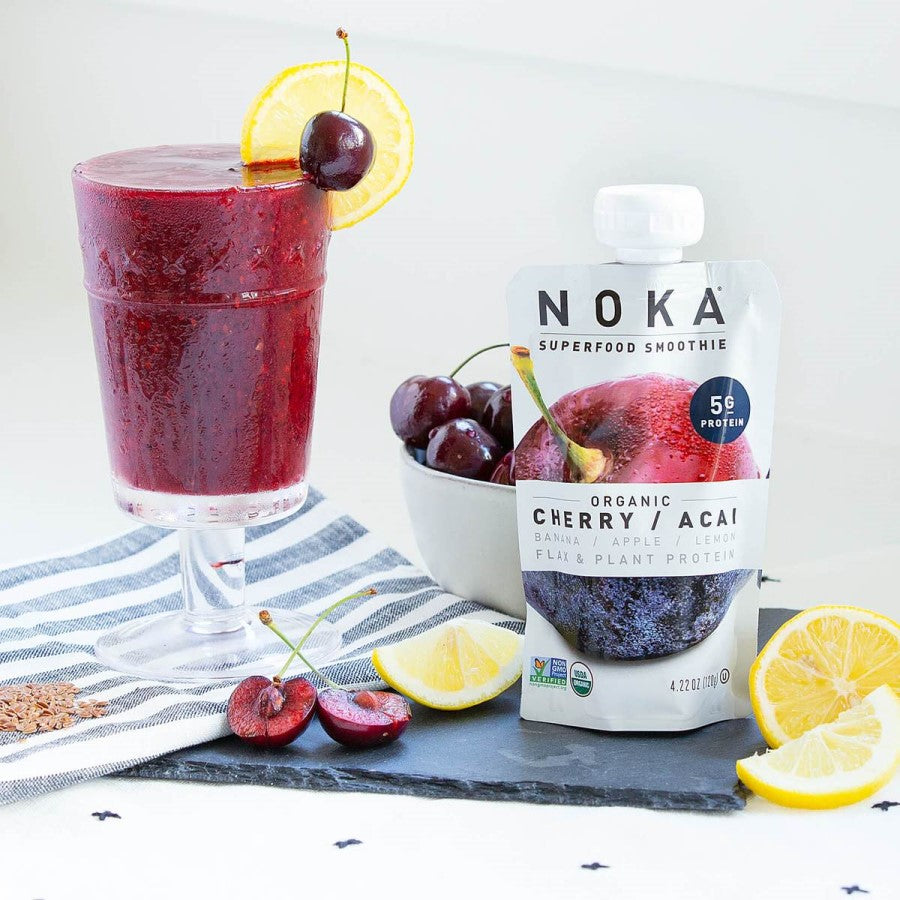 NOKA Superfood Smoothie Organic Cherry Acai Flax Garnished With Fresh Cherry And Lemon