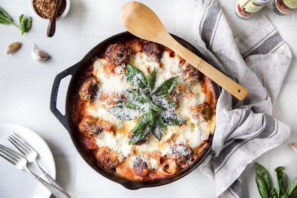 1 Pan Chicken Parmesan Meatball And Burrata Pasta Bake Garnished With Basil And Cheese Made With Organic Noodles From Alessi