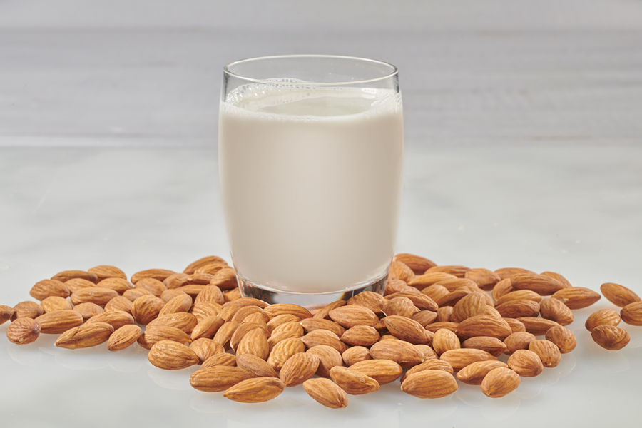 Organic Almonds And Glass Of Better Than Milk Almond Drink