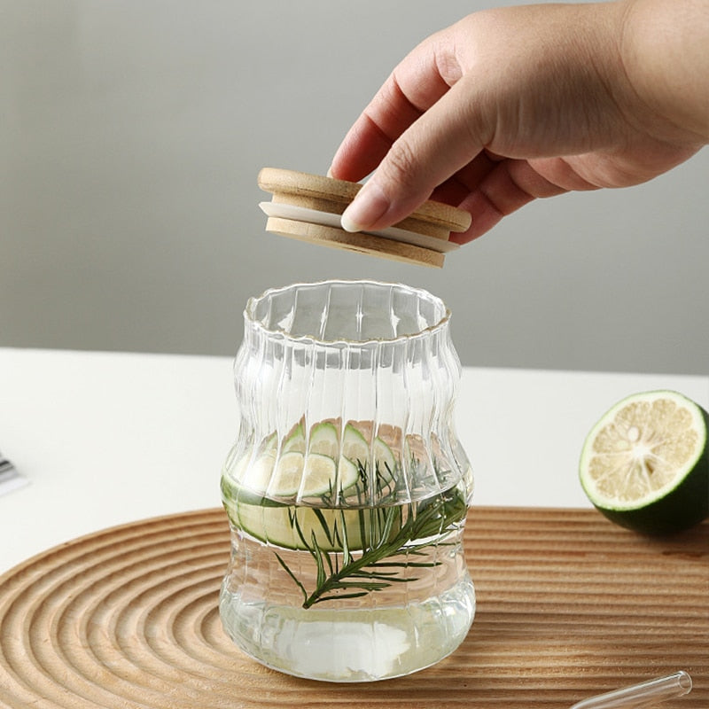 Fresh Herb And Citrus Water In Stylish Drinkware Glass Tumbler With Wooden Lid