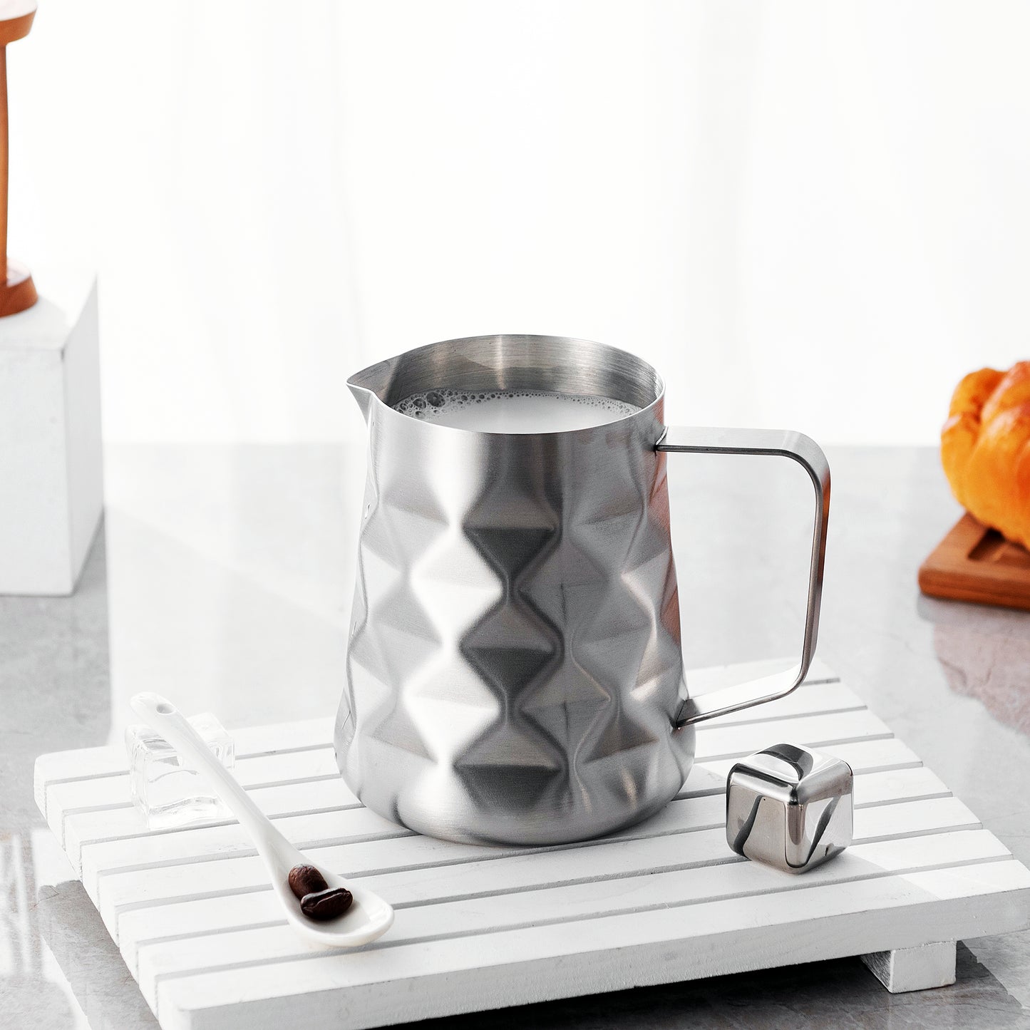 Avant Garde Stainless Steel Frothing Pitcher With Modernist Metal Ice Cube