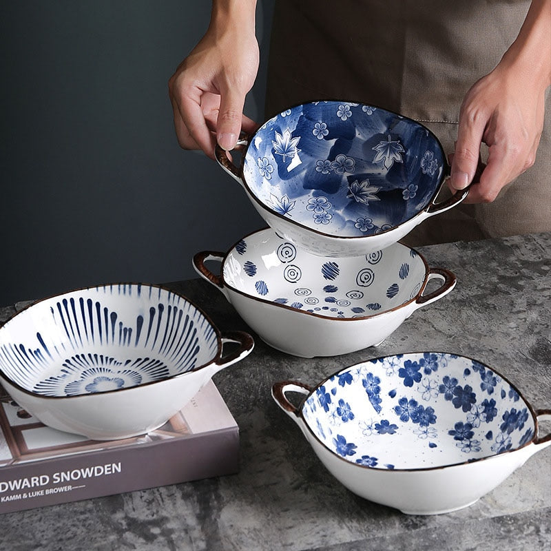 Holding Artisanal Pottery New England Farmhouse Style Bowls In Blue And White Patterns