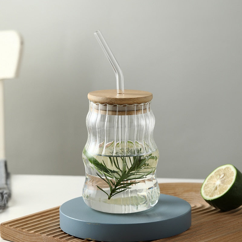 Fresh Herb Water Beverage In Ripply Glass Drink Tumbler With Wooden Bamboo Lid And Glass Straw